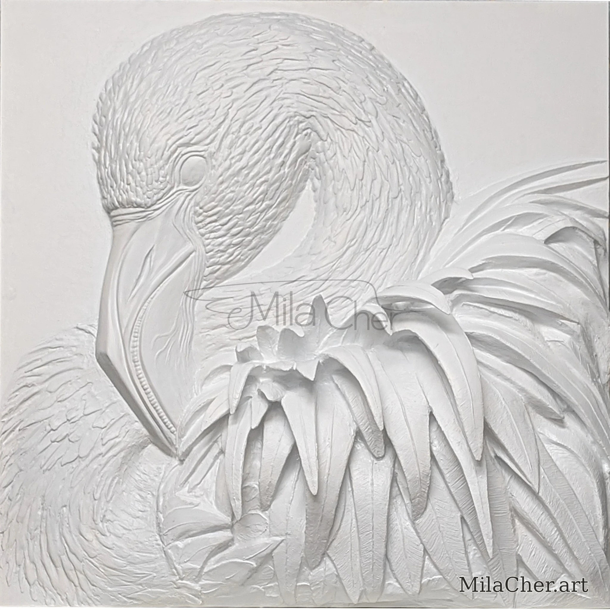 White sculptural relief of a flamingo with its head tucked into ruffled feathers